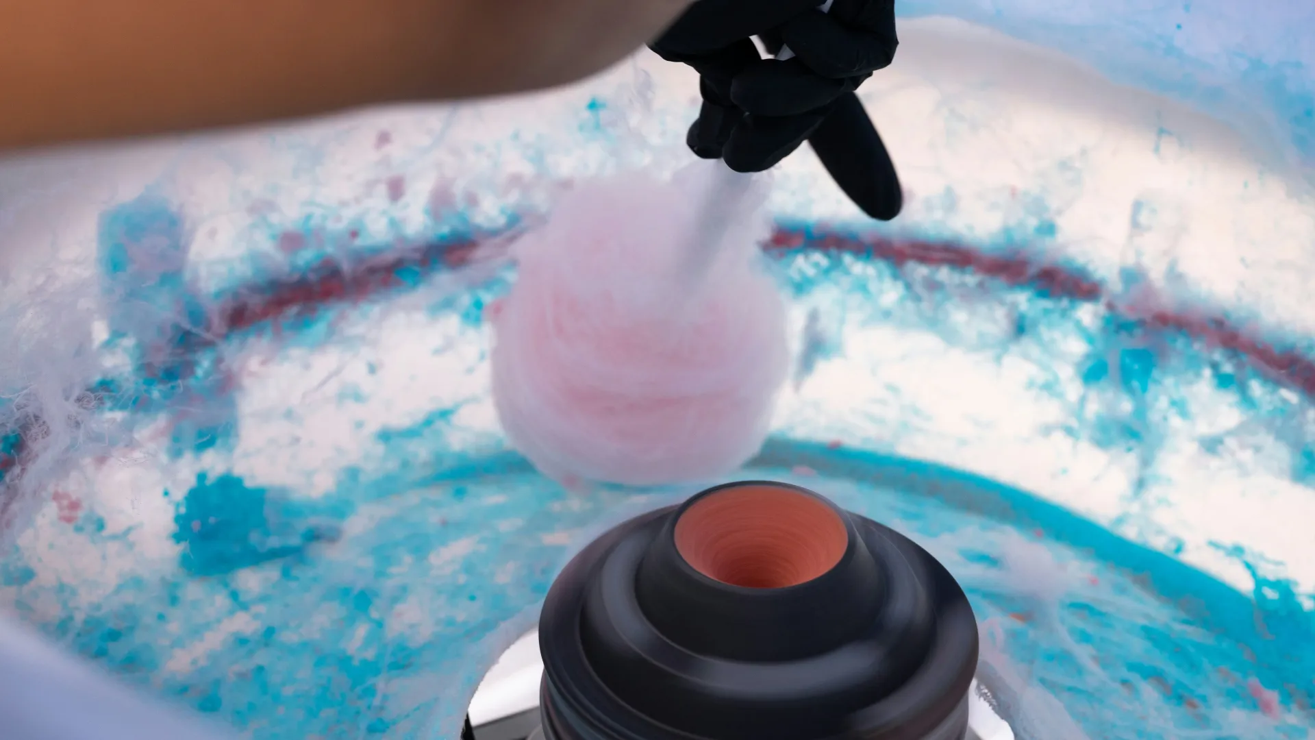 Candy floss spinning from professional machine